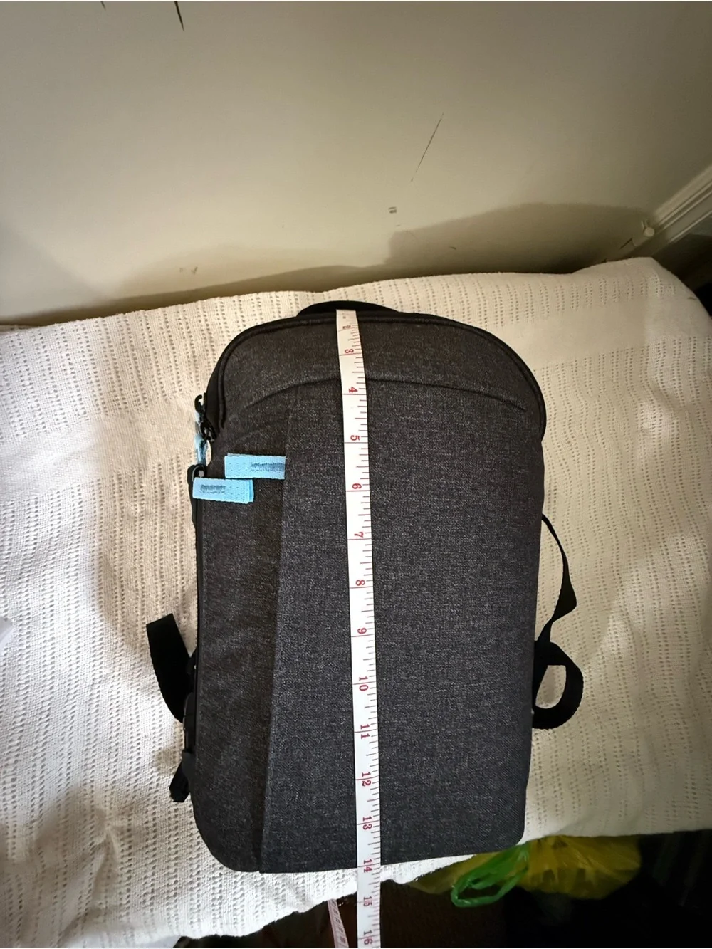 Men's Compact Black Sling Bag with Light Blue Accents